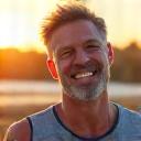 David, a man in his early 50s, looking strong and healthy, perhaps in a home gym setting or after an outdoor run. He exudes vitality and a casual confidence.
